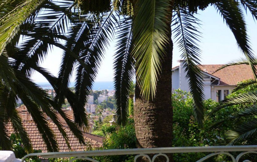 Location de vacances - Appartement à Cannes - Vue sur la baie Cannes du salon