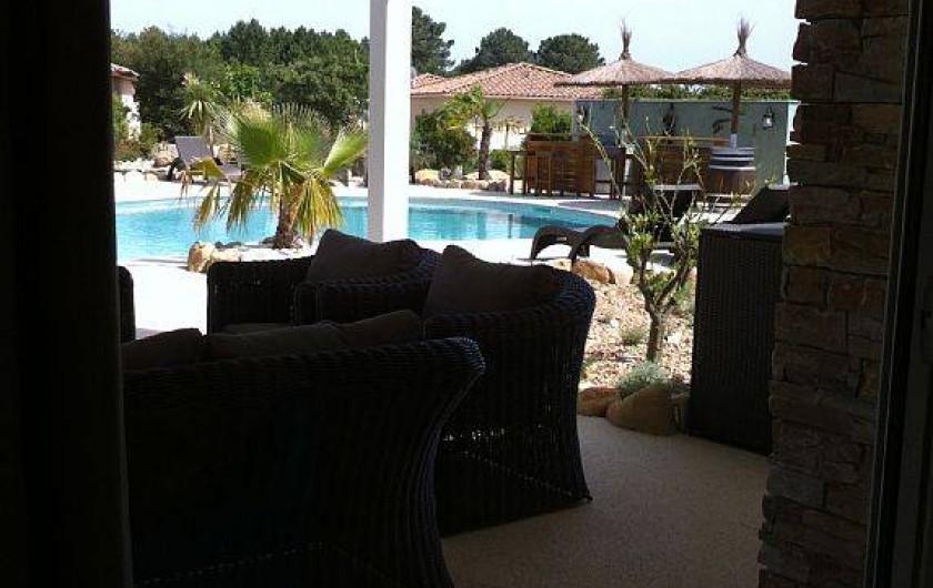 Location de vacances - Villa à Lecci - Pergola extérieure à l'est, côté piscine abritant le salon détente