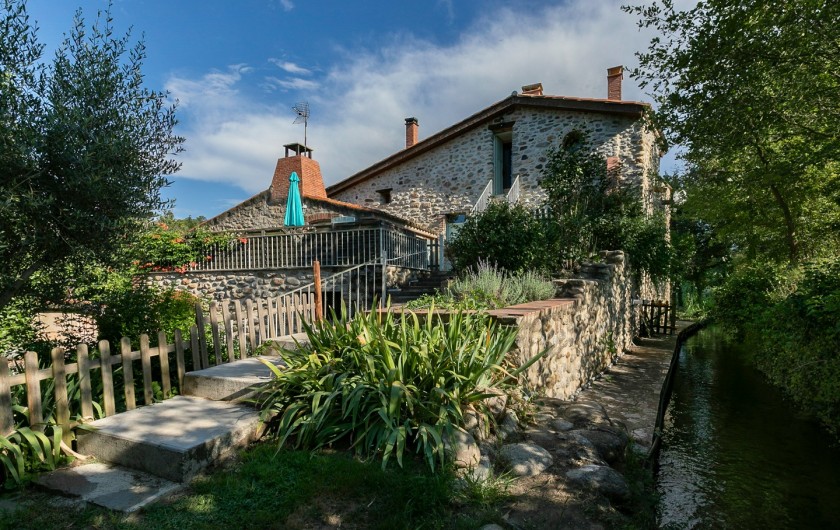 Location de vacances - Gîte à Eus - Moulin le long du ruisseau