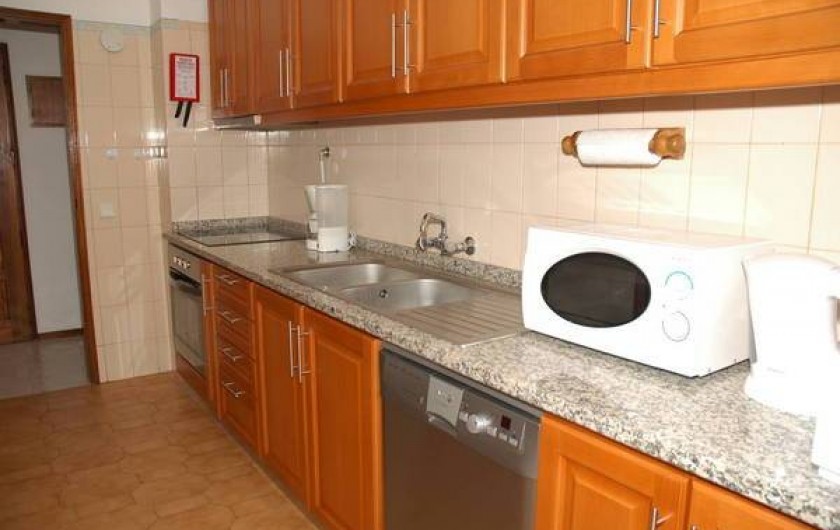 Location de vacances - Appartement à Faro - Cuisine avec aces au balcon