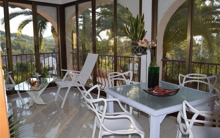 Location de vacances - Villa à Gandia - terrasse cristal pour dining et relaxation