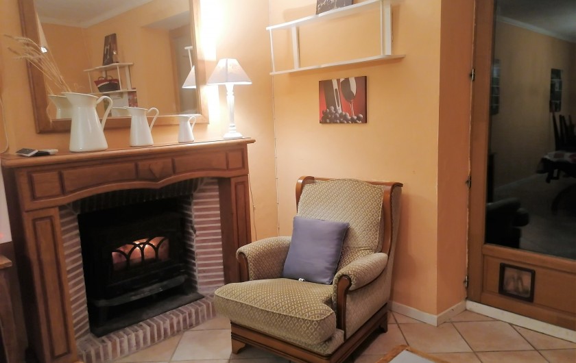 Location de vacances - Gîte à Sury-en-Vaux - Coin cheminée dans le salon