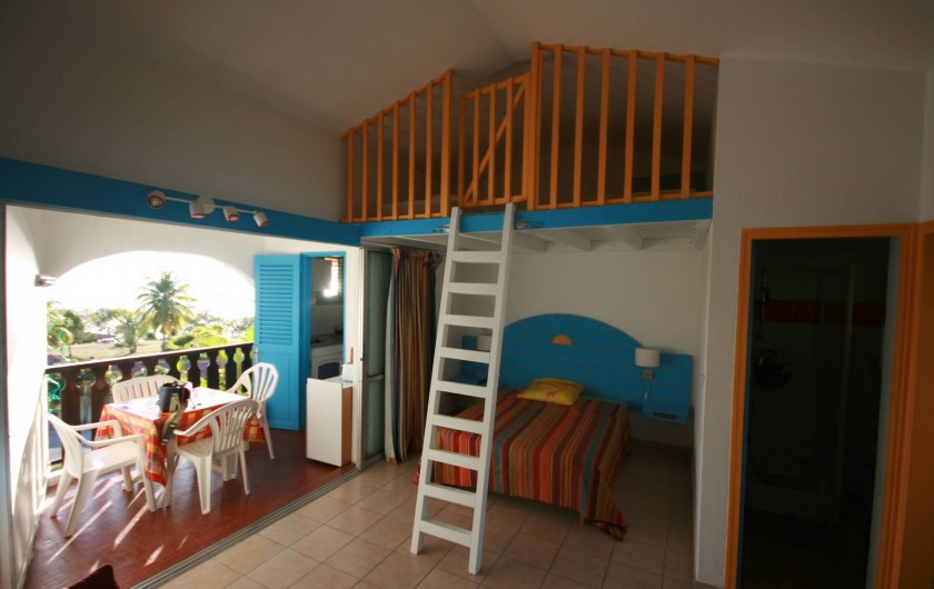 Location de vacances - Appartement à Sainte-Anne - Coin couchage et salle à manger