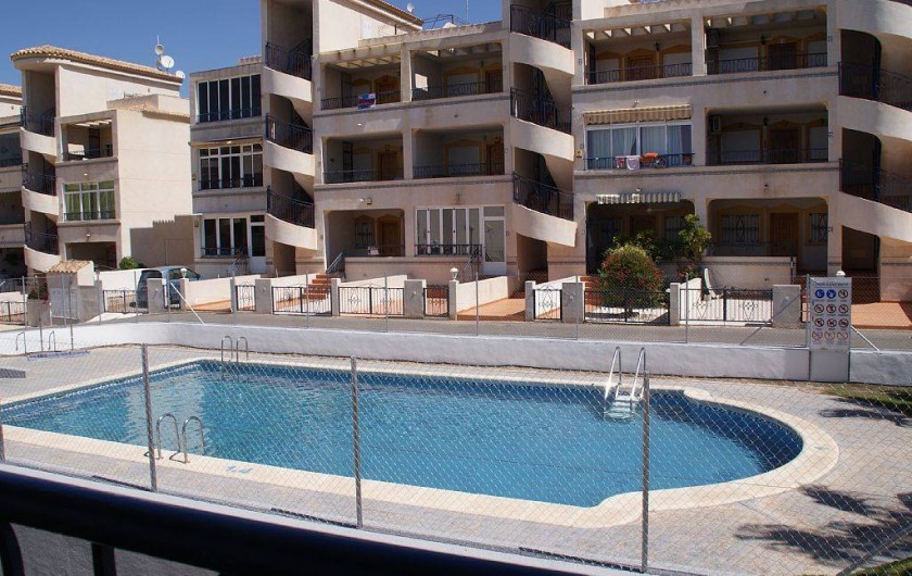 Location de vacances - Appartement à Punta Prima - Piscine au pied de l'immeuble