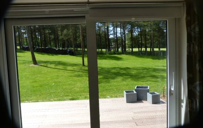 Location de vacances - Appartement à Hardelot-Plage - vue du salon sur le golf des dunes