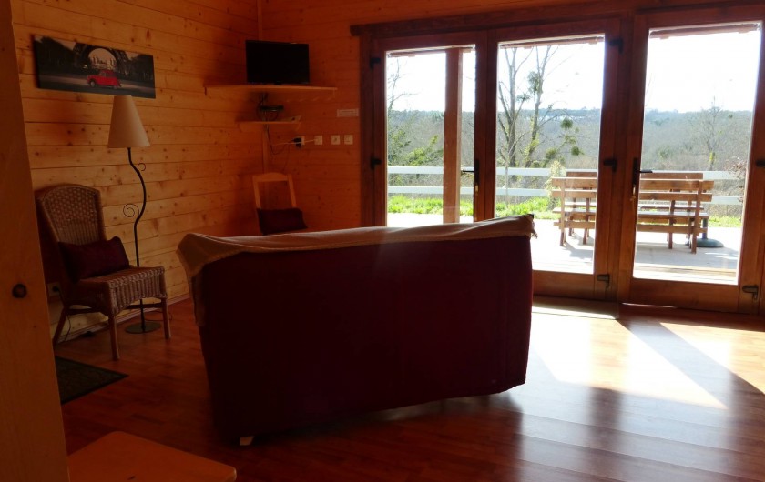 Location de vacances - Chalet à Pompiey - coin repos vue sur la forêt