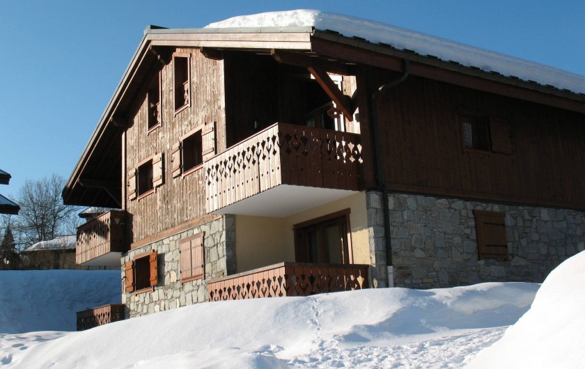 Location de vacances - Appartement à Les Carroz d'Arâches - vue du chalet l'hiver