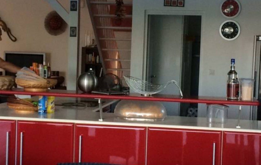 Location de vacances - Villa à Saint-François - cuisine américaine ouverte sur terrasse couverte