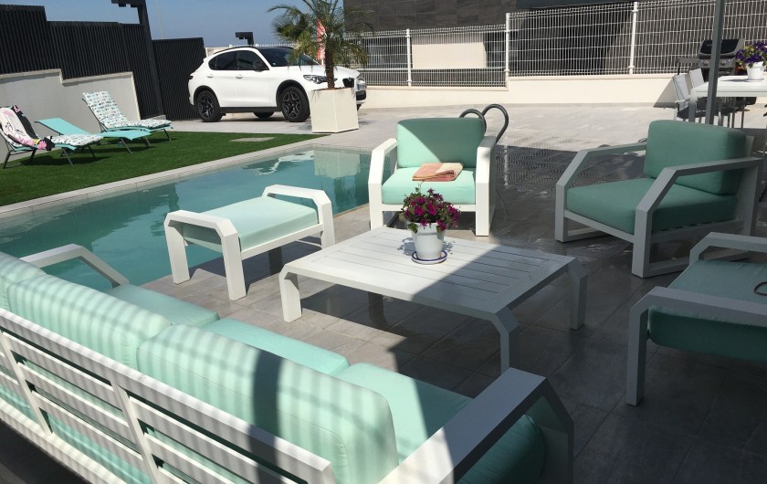 Location de vacances - Villa à San Miguel de Salinas - salon autour de la piscine
