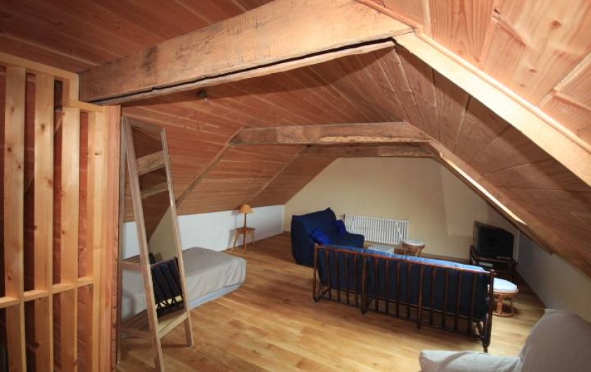 Location de vacances - Maison - Villa à Clohars-Carnoët - coin télé lecture et jeu