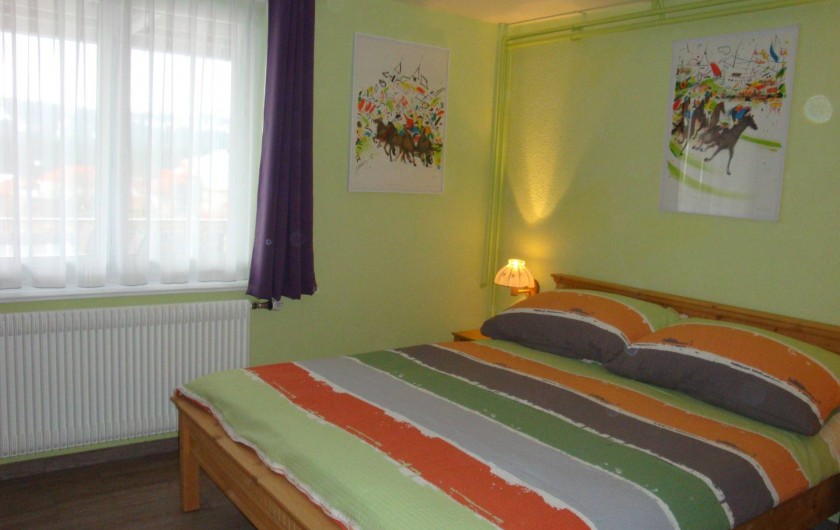 Location de vacances - Appartement à Les Breuleux - chambre à coucher
