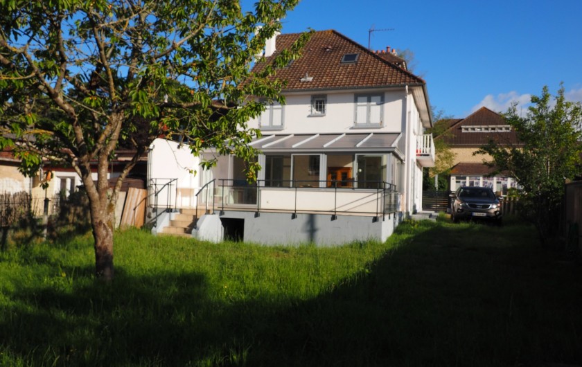 Location de vacances - Appartement à Merville-Franceville-Plage - RDC sur véranda terrasse et jardin