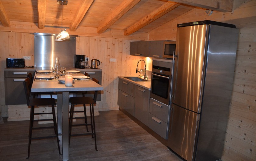 Location de vacances - Studio à L'Alpe d'Huez - salle à manger et cuisine