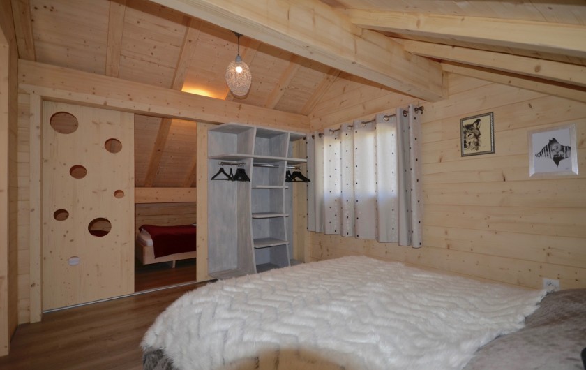 Location de vacances - Chalet à La Pesse - Chambre étage  vue sur alcôve