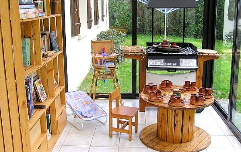 Location de vacances - Villa à Cancale - Le coin ludothèque dans la véranda.
