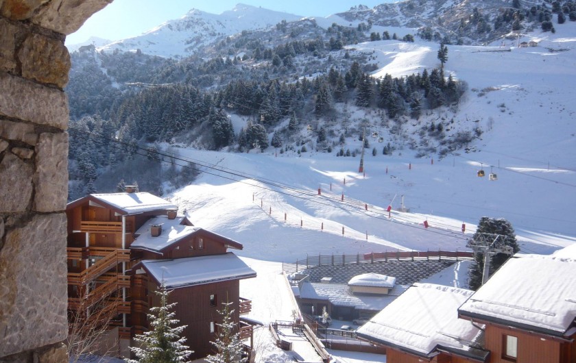 Location de vacances - Appartement à Méribel-Mottaret - Vue depuis le séjour et le balcon