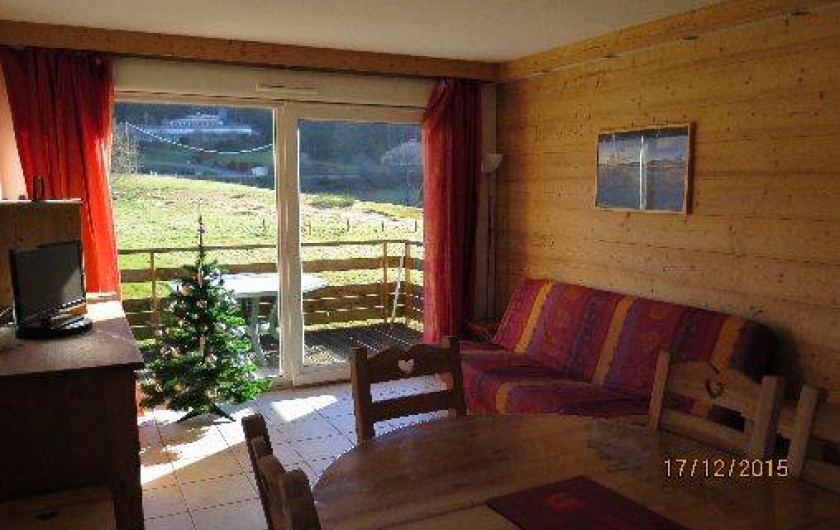 Location de vacances - Appartement à Gérardmer - Séjour avec clic-clac