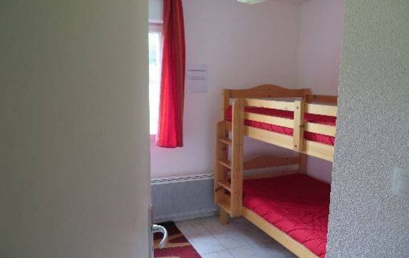 Location de vacances - Appartement à Gérardmer - Chambre avec lits superposés
