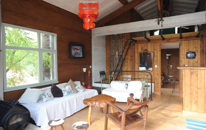 Location de vacances - Chalet à Le Cap Ferret - vue salle de séjour coté salon.