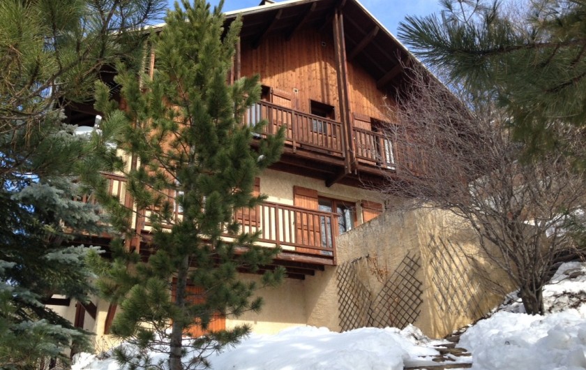 Location de vacances - Chalet à Briançon - chalet sous la neige