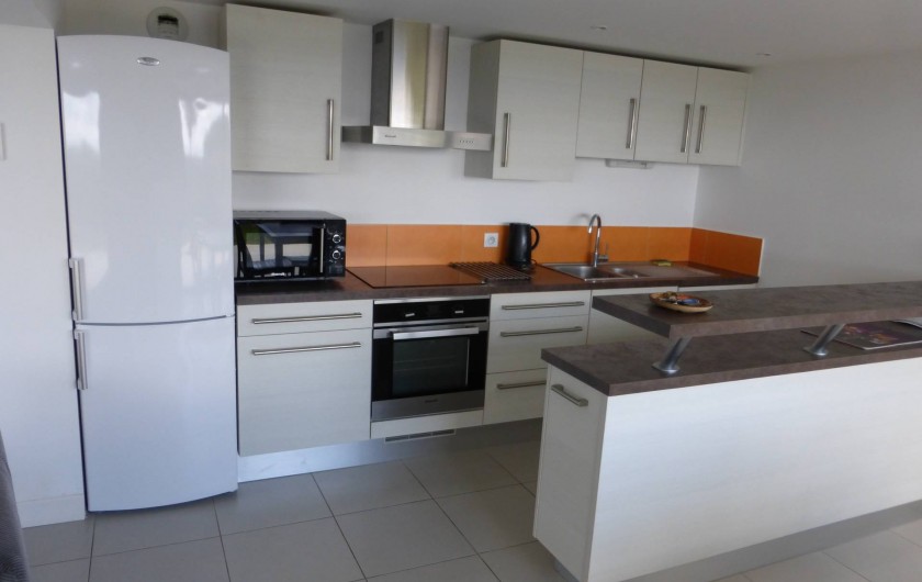 Location de vacances - Appartement à Soorts-Hossegor - appartement n°1: la cuisine derrière le bar