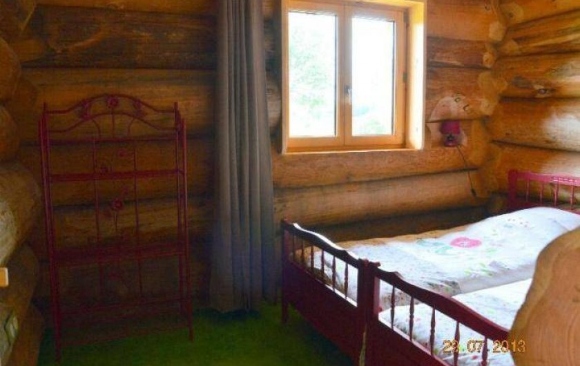 Location de vacances - Chambre d'hôtes à Saint-Anthème - Chalet en rondins de bois