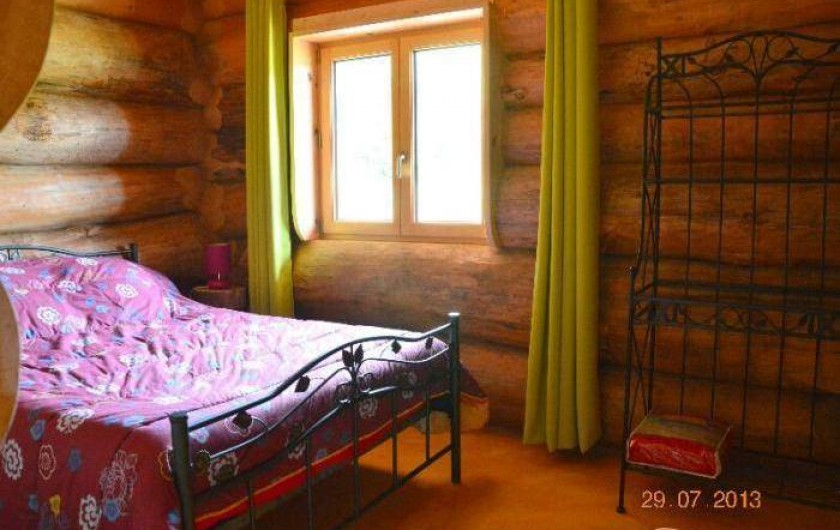 Location de vacances - Chambre d'hôtes à Saint-Anthème - Chalet en rondins de bois