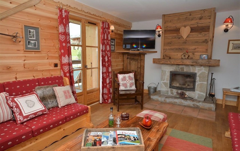 Location de vacances - Chalet à L'Alpe d'Huez - Salon avec sa cheminée