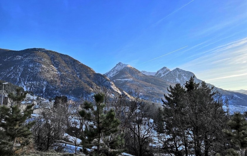 Location de vacances - Chalet à Briançon - Vue panoramique de la terrasse.