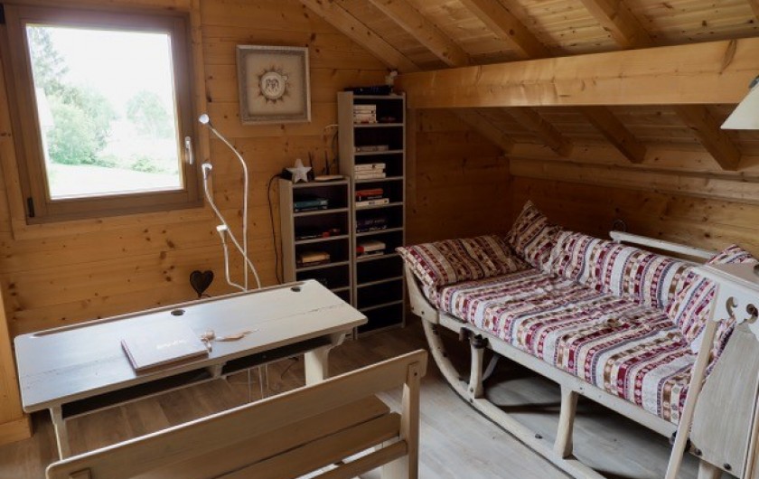Location de vacances - Chalet à La Pesse - mezzanine avec canapé une place
