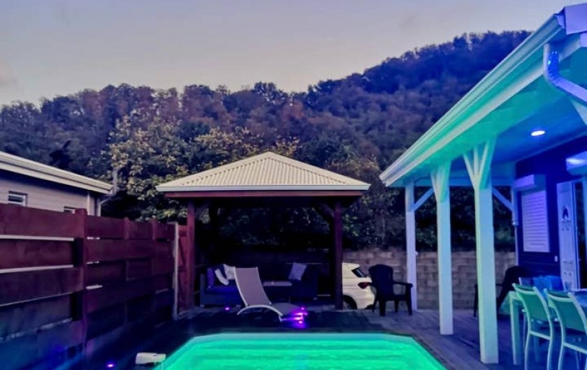 Location de vacances - Villa à Bouillante - VUE DU JACUZZI AU LEVER DU SOLEIL