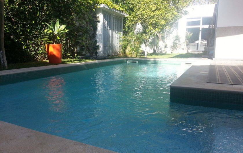 Location de vacances - Villa à El Jadida - Piscine en L avec marches d'accès