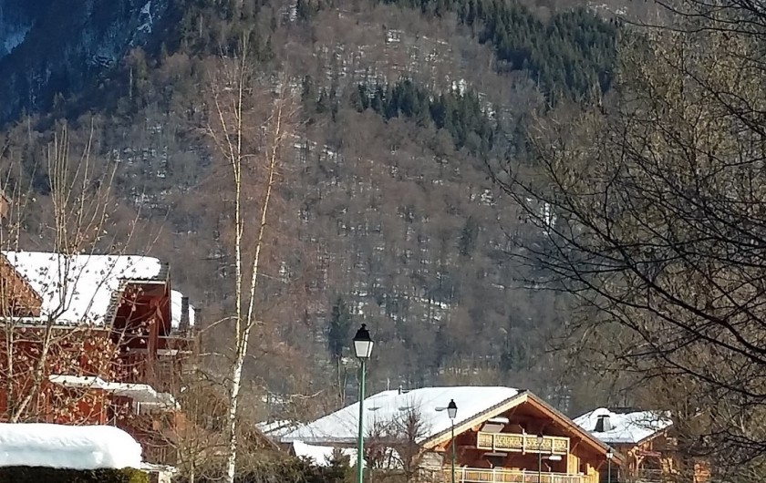 Location de vacances - Appartement à Samoëns - vue résidence en hiver