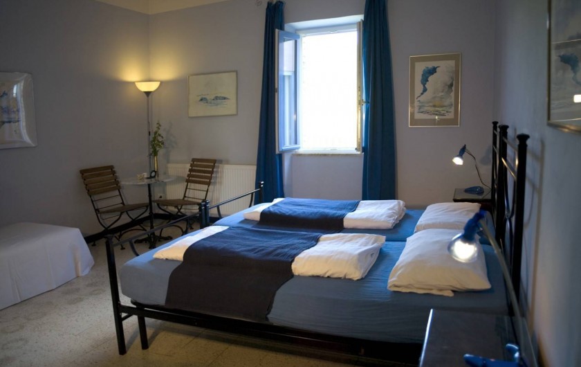 Location de vacances - Appartement à Castel Rigone - Chambre lit "Camera blu" dans appt. "Il Peperino" La Rogaia