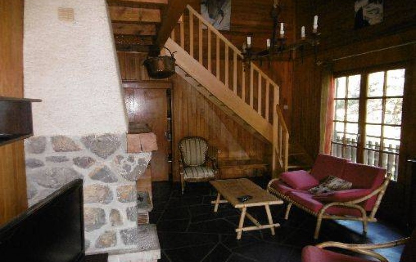 Location de vacances - Chalet à Alex - Séjour cheminée et coin détente