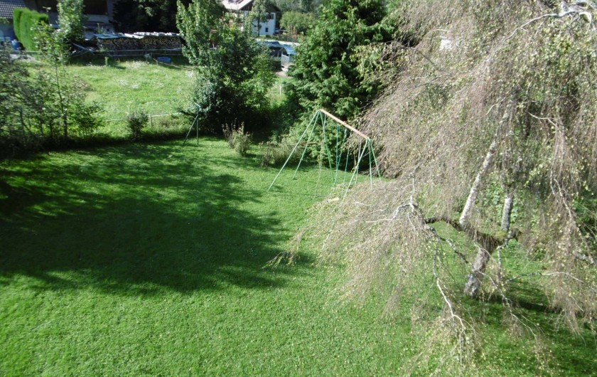 Location de vacances - Chalet à Alex - le jardin avec les balançoires