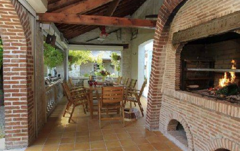 Location de vacances - Chambre d'hôtes à Marchais - salle de petit déjeuner et table d'hôte d'été