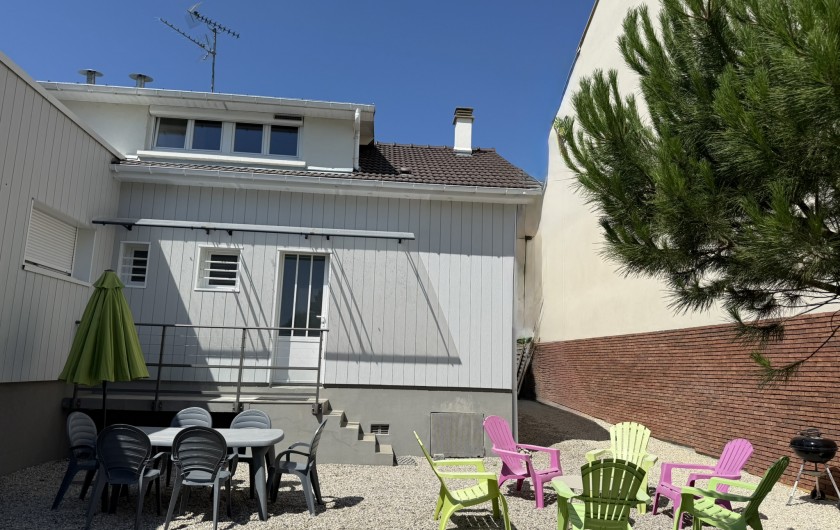 Location de vacances - Villa à Blonville-sur-Mer - Le jardin à l'arrière de la maison