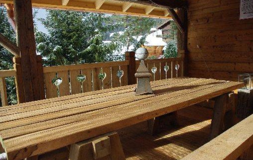 Location de vacances - Chalet à Manigod - Terrasse couverte