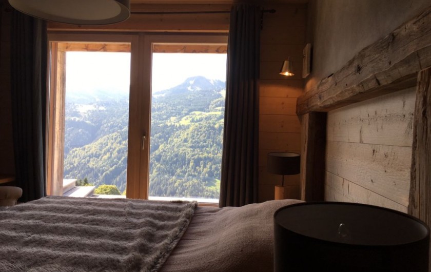 Location de vacances - Chalet à Manigod - Chambre RDJ avec accès terrasse Sud