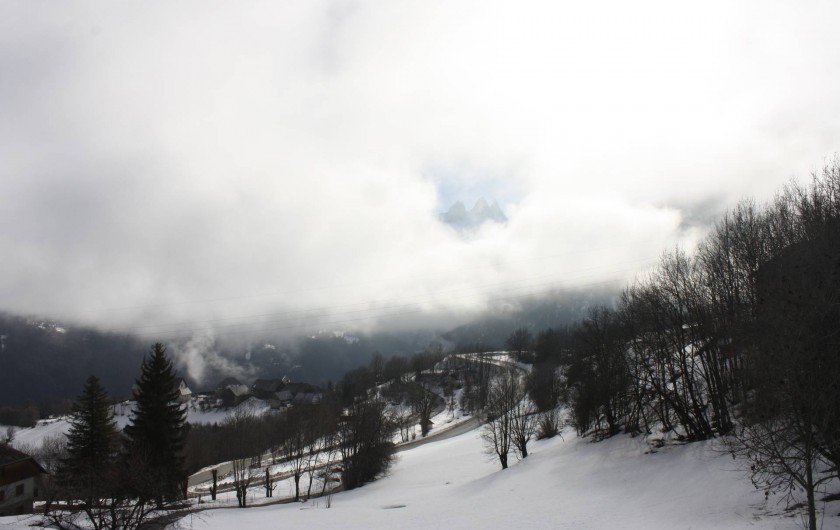 Location de vacances - Chalet à Fontcouverte-la-Toussuire - Vue imprenable sur les Aiguilles d'Arves, même avec les nuages !