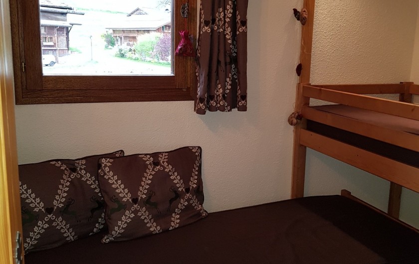 Location de vacances - Appartement à Le Grand-Bornand - Chambre lits superposés 1/2