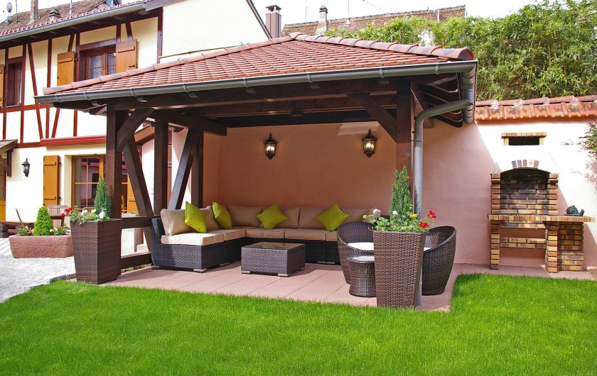 Location de vacances - Chambre d'hôtes à Beblenheim - Le jardin avec son espace détente