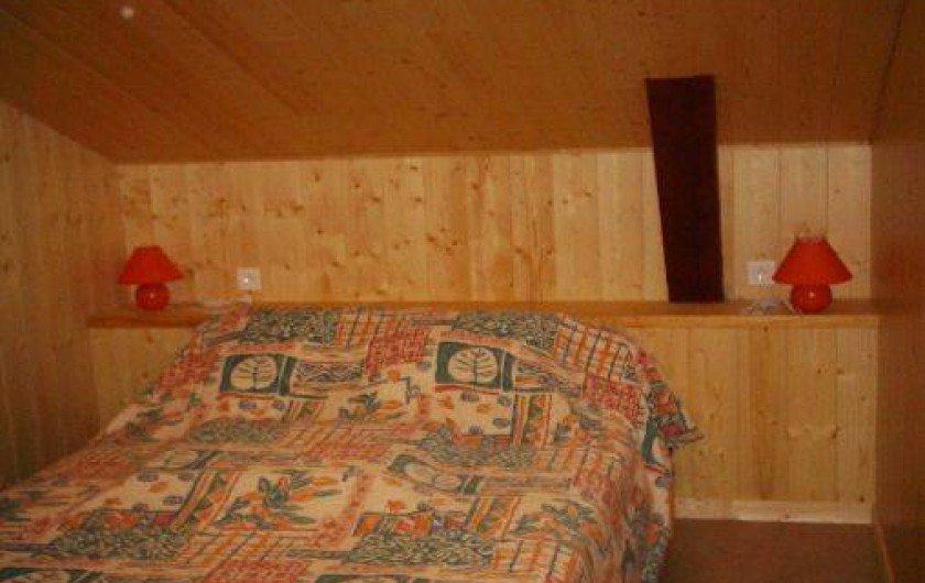 Location de vacances - Gîte à Landos - chambre1 avec saSDE