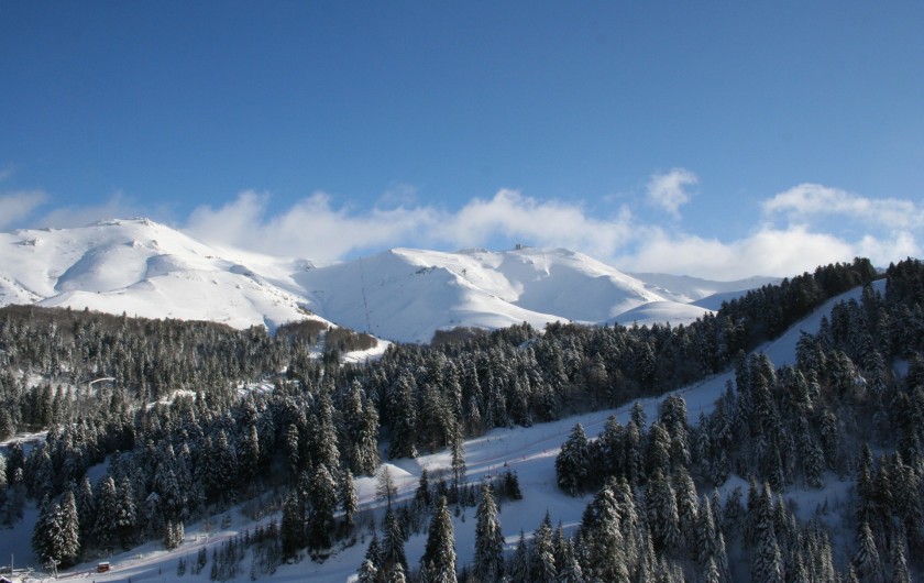 Location de vacances - Appartement à Super Lioran - Vue balcon hiver