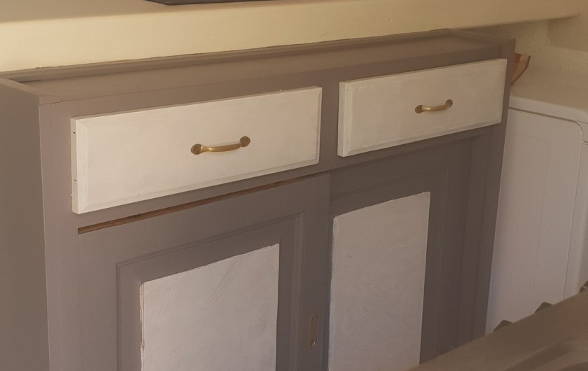 Location de vacances - Villa à Porto-Vecchio - Bar séparation cuisine/salon Meuble rangement