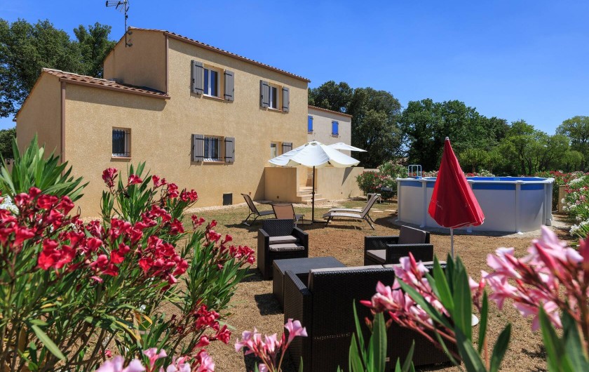 Location de vacances - Villa à Argilliers - arrière de la maison