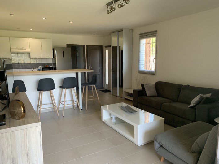 Location de vacances - Appartement à Porto-Vecchio - Cala Ross' Appart - Pièce à vivre climatisée
