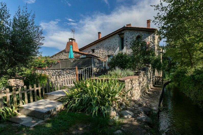 Location de vacances - Gîte à Eus - Moulin le long du ruisseau
