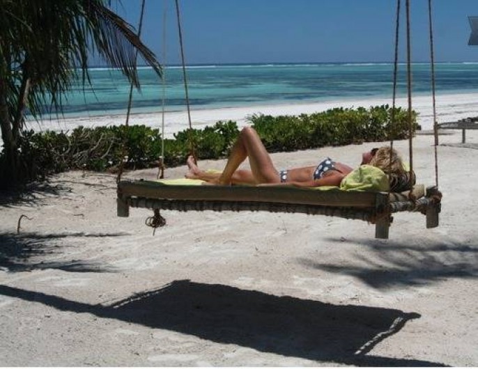 Location de vacances - Villa à Zanzibar - Hamac Zanzibari depuis notre plage privée avec la lagune au fond.